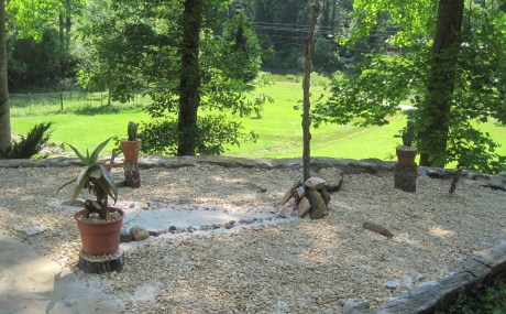 Zen garden from the stream that runs to the left of it. 