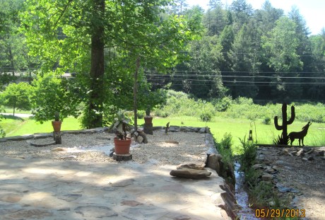 Ava's Star shines blinks "hello" right above the end of the wolf's nose above the tree line. 