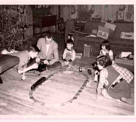 Friend Christmas first train -Murray Gordan helping 1950s